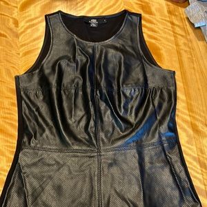 Women’s faux leather sleeveless top! Dress it up or throw it on with jeans! xs